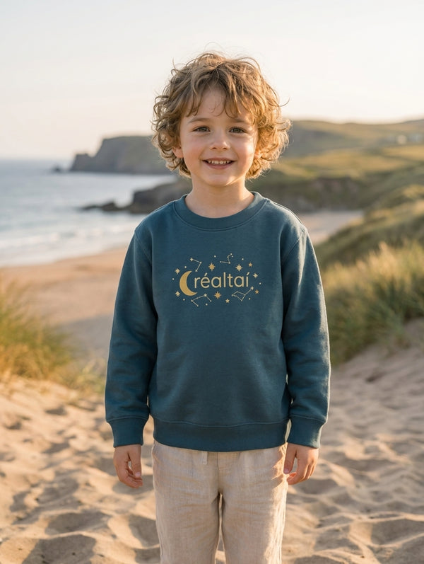 Child wearing twilightblue sweatshirt with stars design, portrait