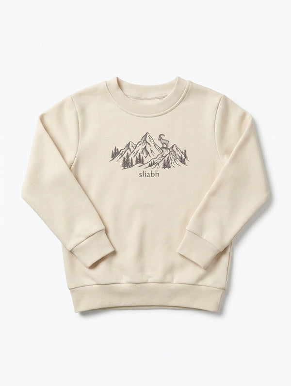 beige kids sweatshirt with mountain illustration on white background