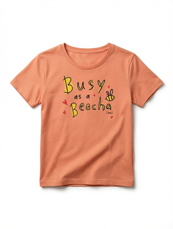 peach kids t-shirt with bee illustration on white background