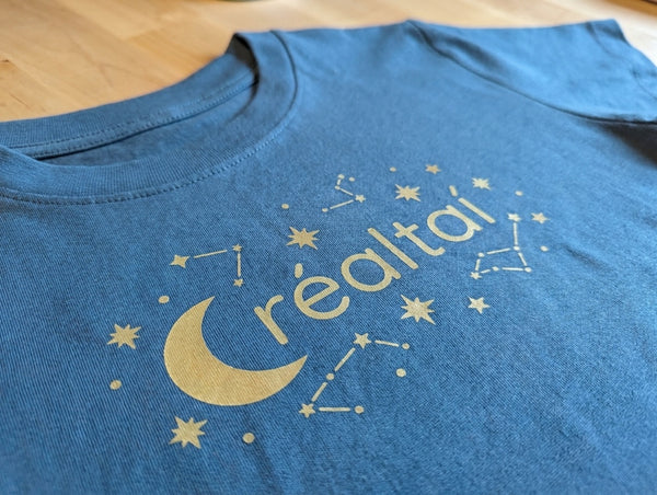 Close-up detail of stars illustration on twilightblue t-shirt