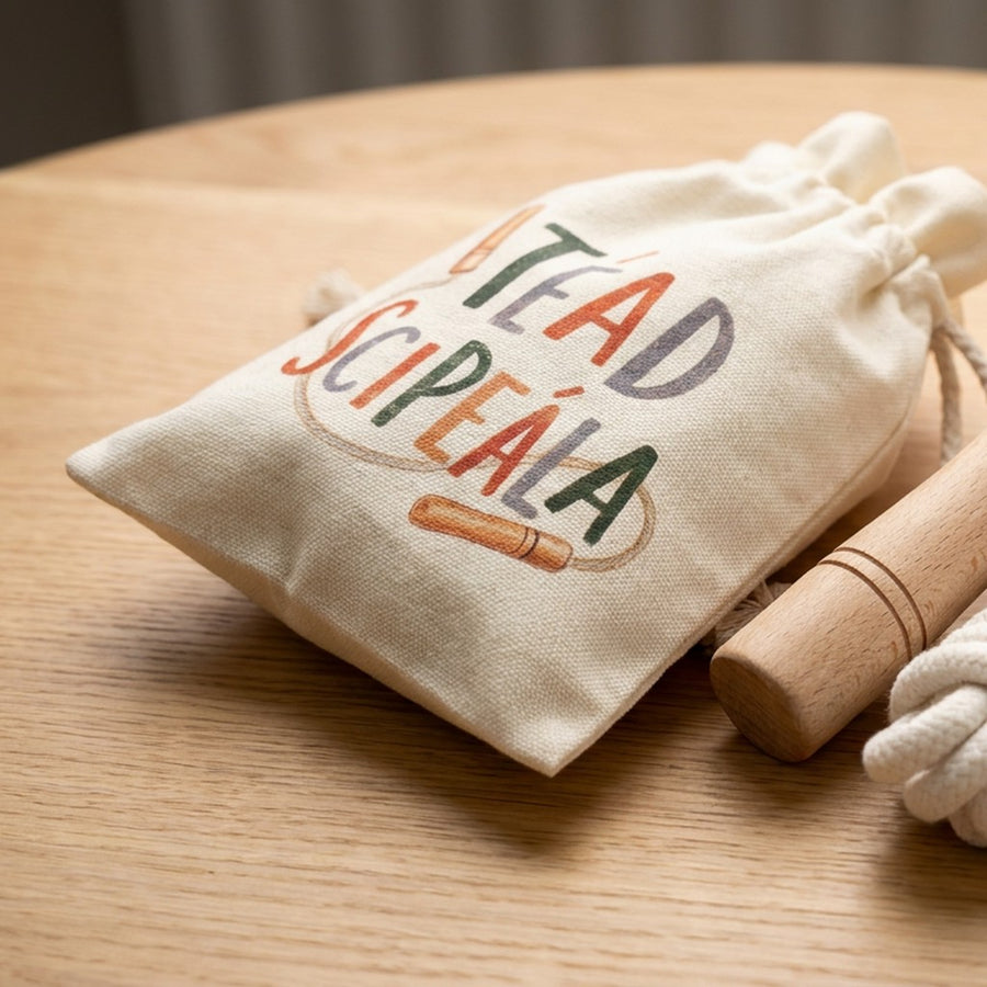 Close-up of the Téad Scipeála design printed on the cotton drawstring bag