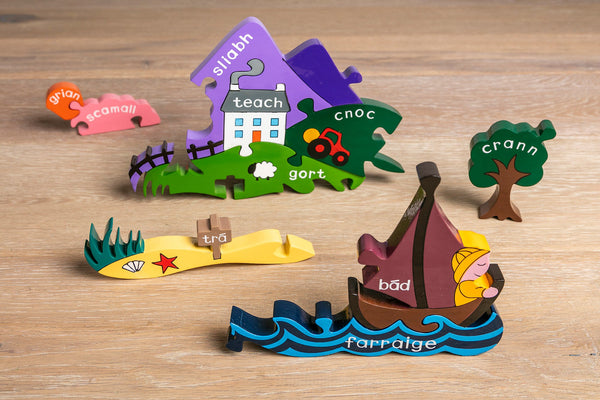 Child playing with the standing pieces of the Irish Scene wooden jigsaw