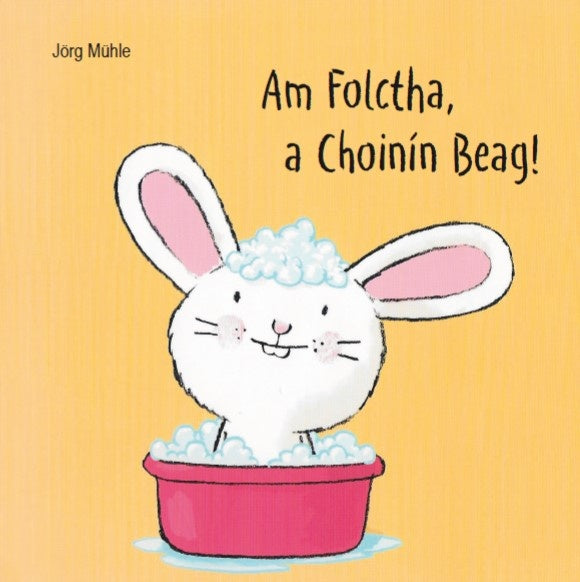 Am Folctha, a Choinín Beag! Board Book cover, Irish language children's book, Little Rabbit having a bubbly bath