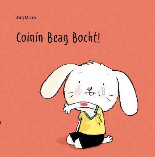 Coinín Beag Bocht! Board Book cover, Irish language children's book, a little rabbit who has hurt his elbow