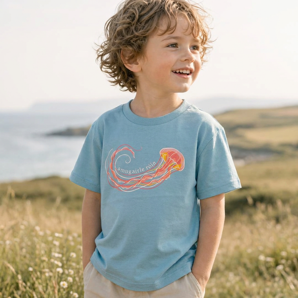 Styled editorial photo of teal kids t-shirt with jellyfish illustration