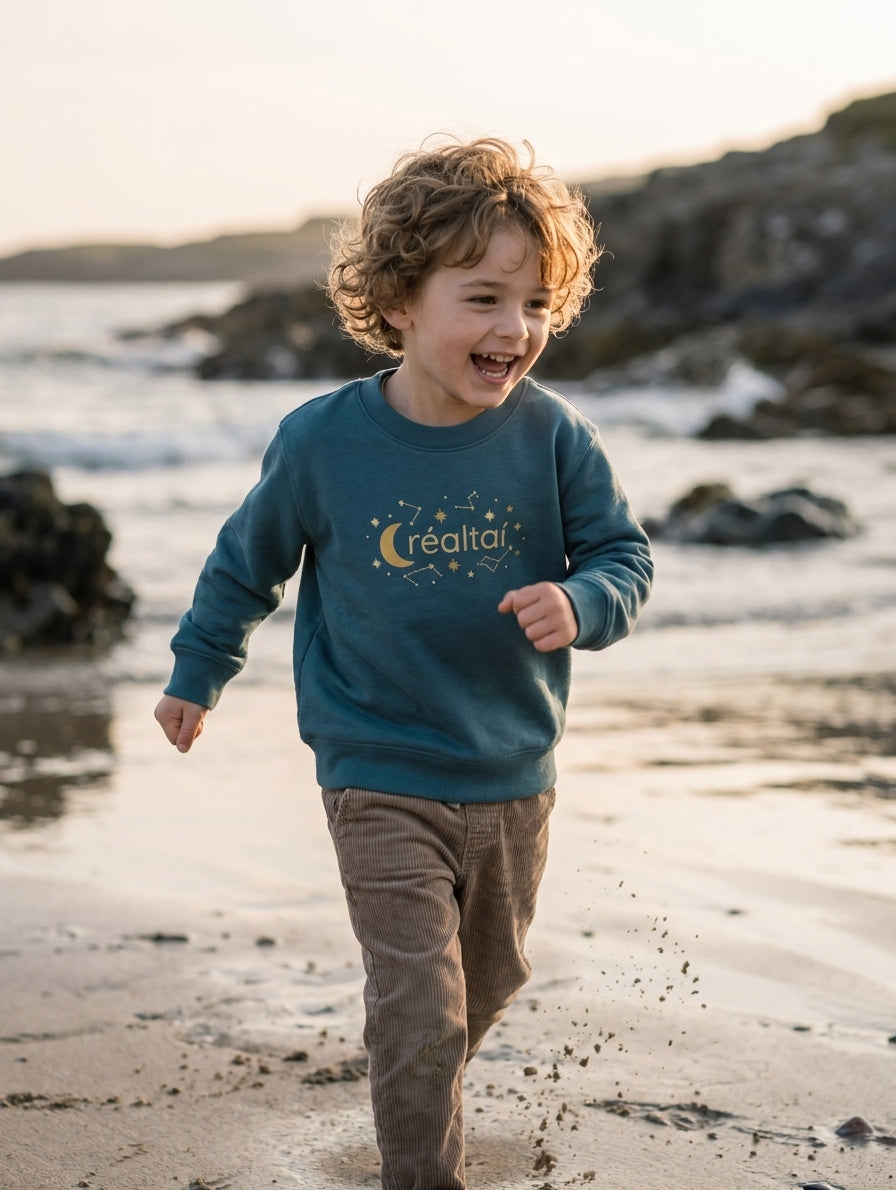 Child in motion wearing twilightblue sweatshirt with stars design