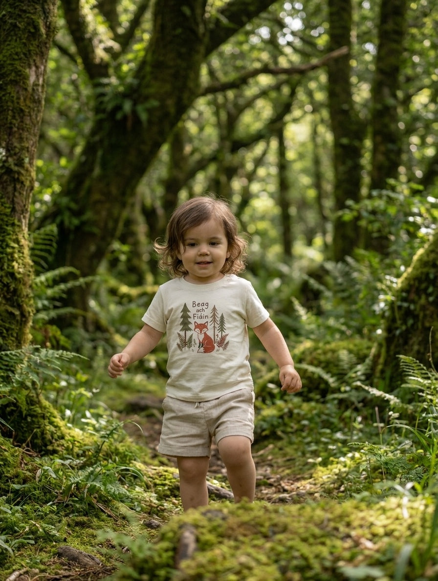 Child in motion wearing oatmeal t-shirt with beagfiain design