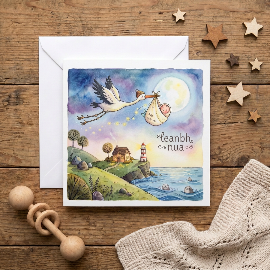 Leanbh Nua Irish language new baby greeting card flat lay with envelope and wooden toys on rustic table - Glasog Ireland