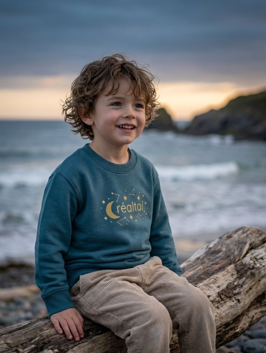 Child wearing twilightblue sweatshirt with stars design, portrait