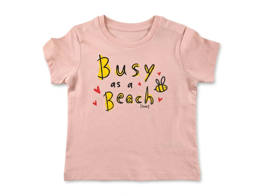 peach Baby Creator t-shirt with bee design — laid flat on white background